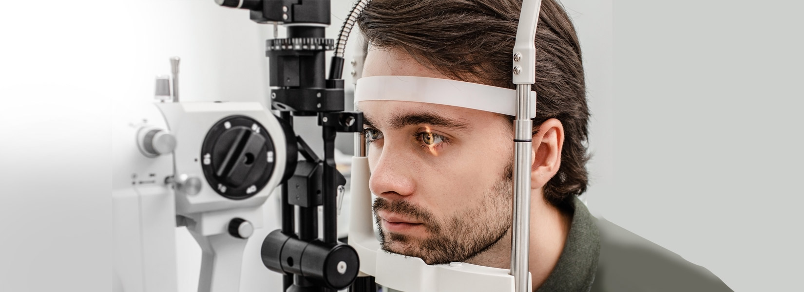 young man during eye exam in Lancaster